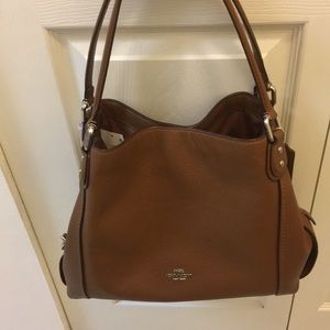 Brand new with tags coach purse. No low ball offer